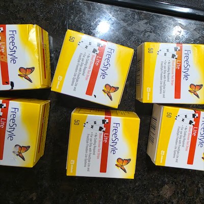 Sealed FreeStyle Lite blood glucose test strip boxes, 50 count